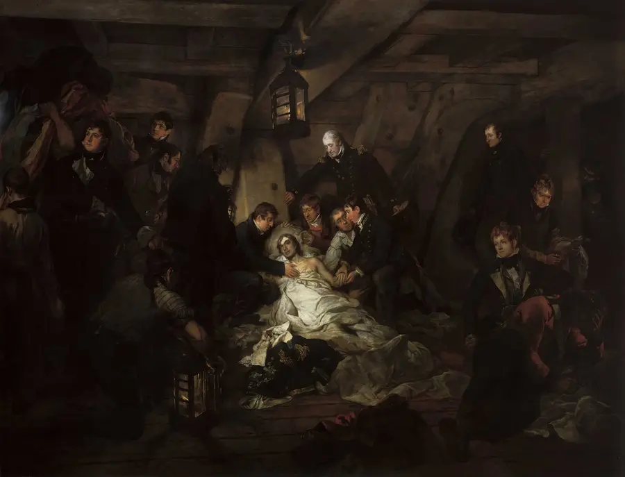Painting of Nelson lying wounded on the dim lower deck of HMS Victory, surrounded by officers and sailors holding lanterns